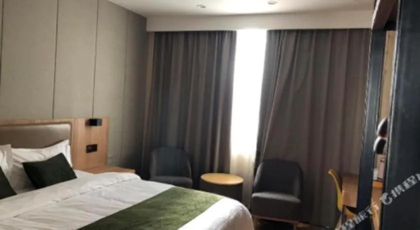 Bed in GreenTree Inn Jining Jianshe Road Hotel