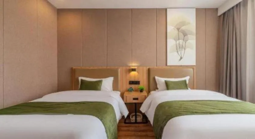 Bed in GreenTree Inn Jining Jianshe Road Hotel