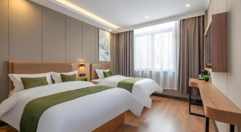 Bed in GreenTree Inn Jining Jianshe Road Hotel
