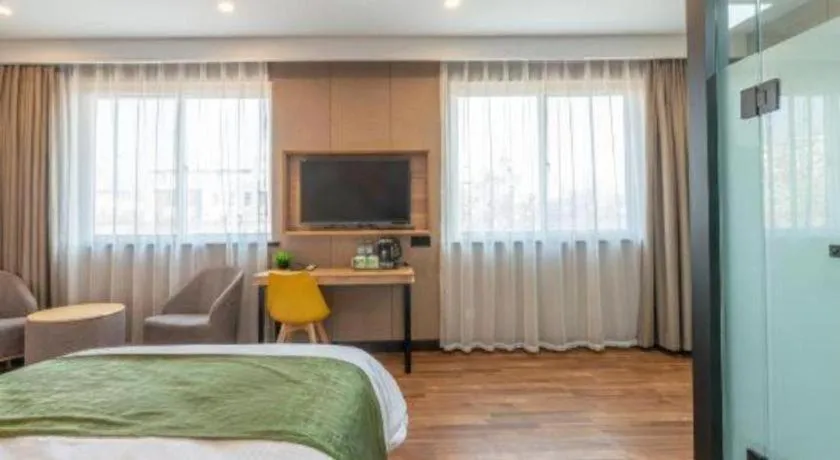 Bed in GreenTree Inn Jining Jianshe Road Hotel