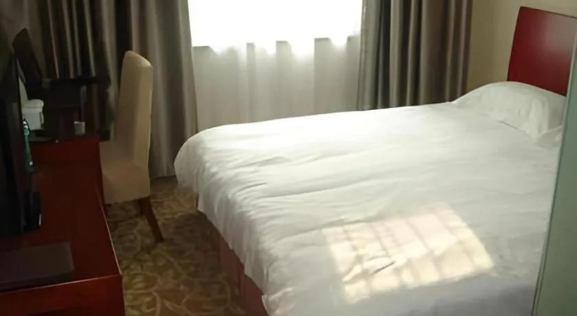 Bed in GreenTree Inn Jining Jianshe Road Hotel