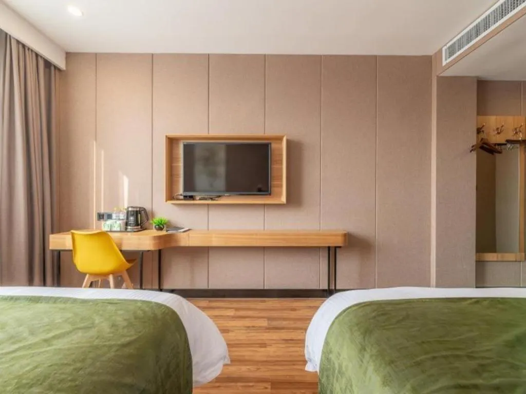 Bed in GreenTree Inn Jining Jianshe Road Hotel