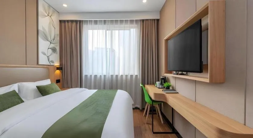 Bed in GreenTree Inn Jining Jianshe Road Hotel