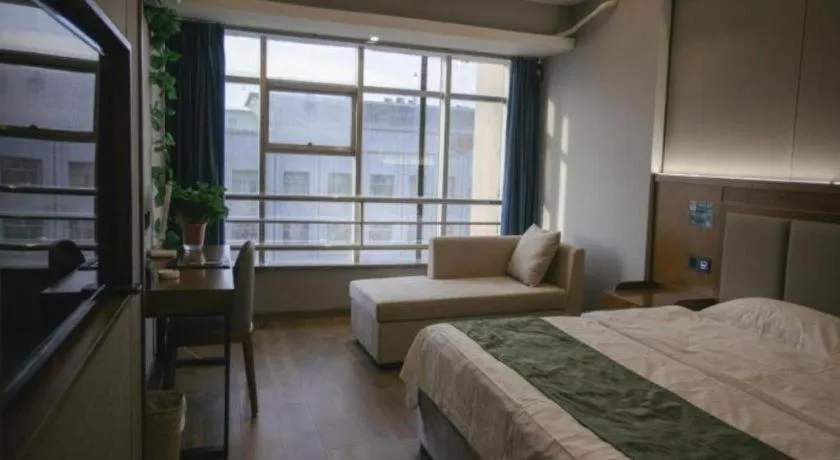 Bed in GreenTree Inn Jiuquan Century Plaza Hotel