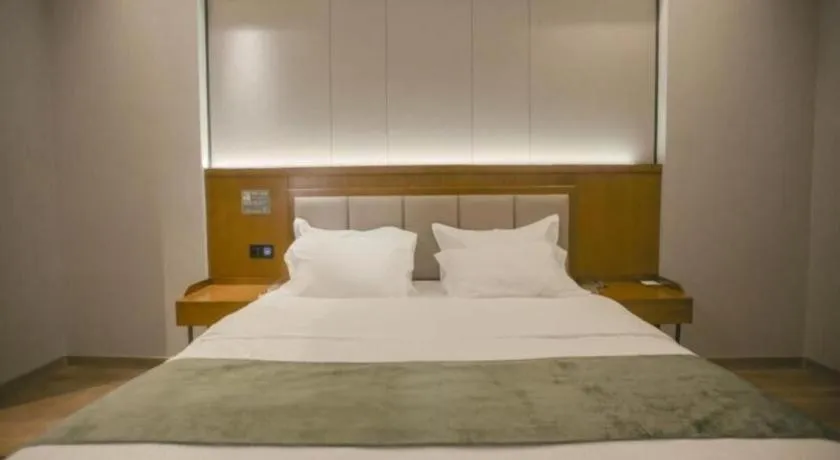 Bed in GreenTree Inn Jiuquan Century Plaza Hotel