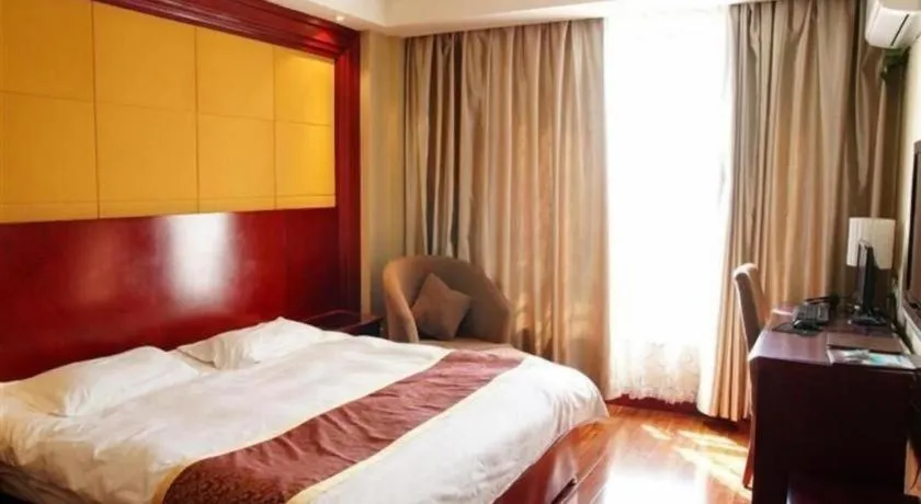 Bed in GreenTree Inn Jiuquan Century Plaza Hotel