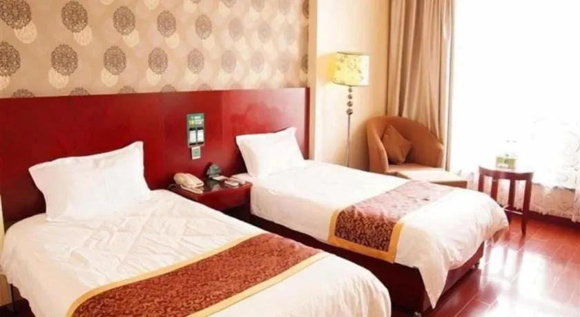Bed in GreenTree Inn Jiuquan Century Plaza Hotel