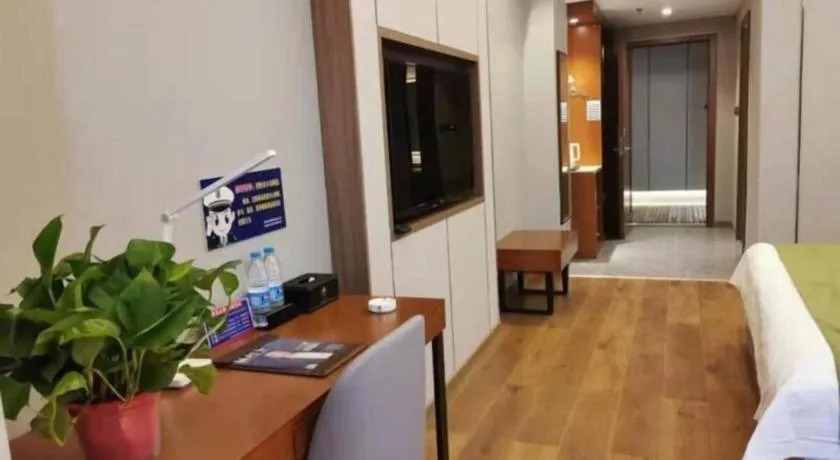 Bed in GreenTree Inn Jiuquan Century Plaza Hotel