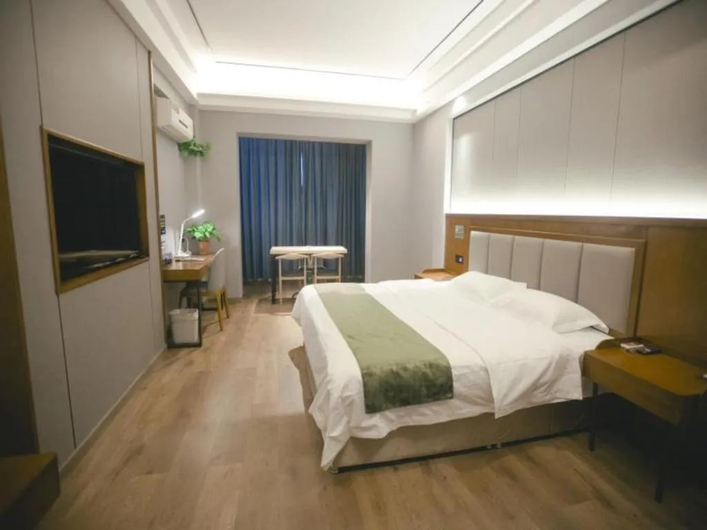 Bed in GreenTree Inn Jiuquan Century Plaza Hotel