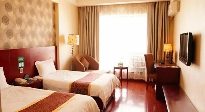 Bed in GreenTree Inn Jiuquan Century Plaza Hotel