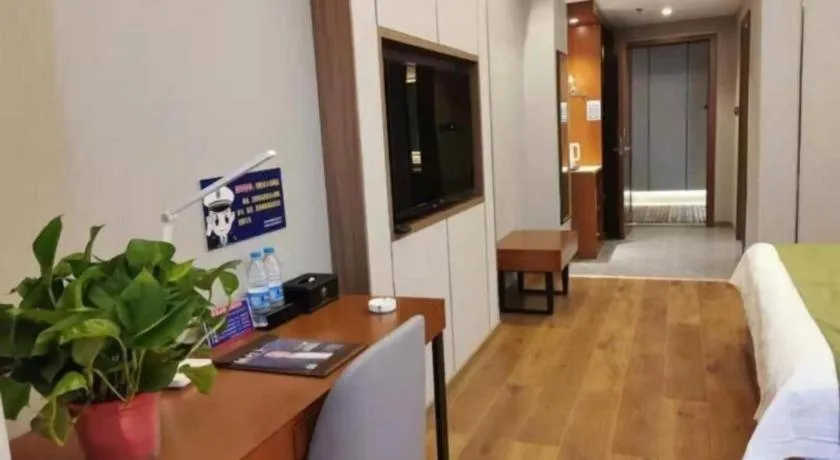 Bed in GreenTree Inn Jiuquan Century Plaza Hotel