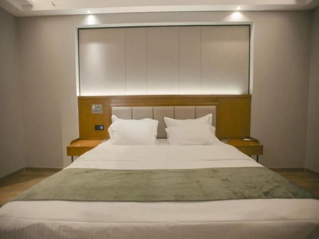 Bed in GreenTree Inn Jiuquan Century Plaza Hotel