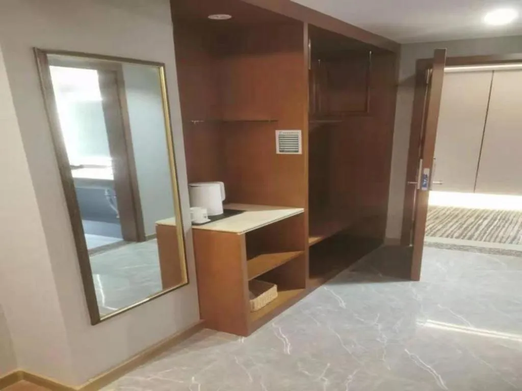 Bed in GreenTree Inn Jiuquan Century Plaza Hotel