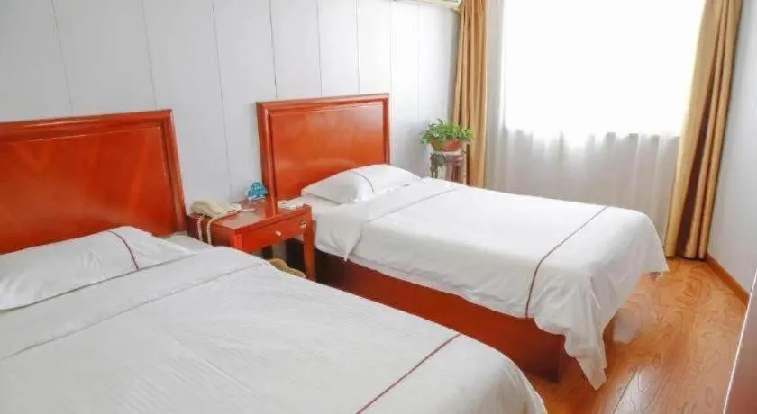 Bed in GreenTree Inn Yantai Xingfu Road Marina Plaza Express Hotel
