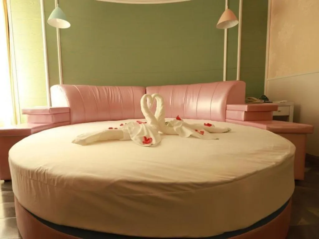 Bed in GreenTree Inn Yantai Xingfu Road Marina Plaza Express Hotel