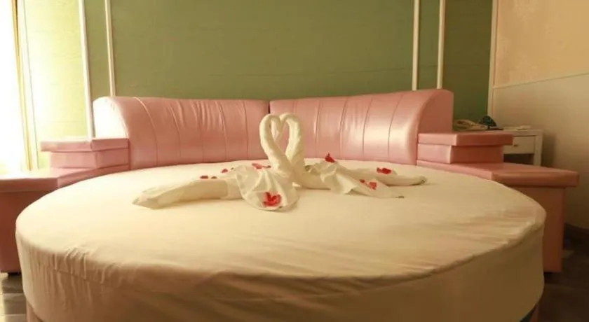 Bed in GreenTree Inn Yantai Xingfu Road Marina Plaza Express Hotel