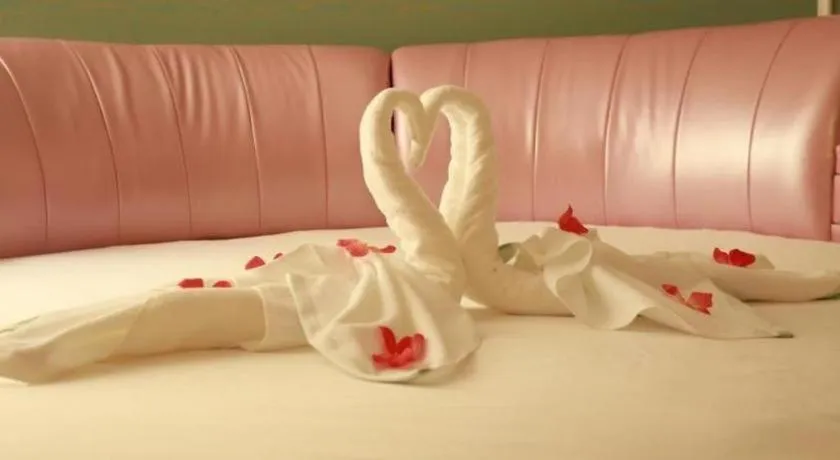 Bed in GreenTree Inn Yantai Xingfu Road Marina Plaza Express Hotel