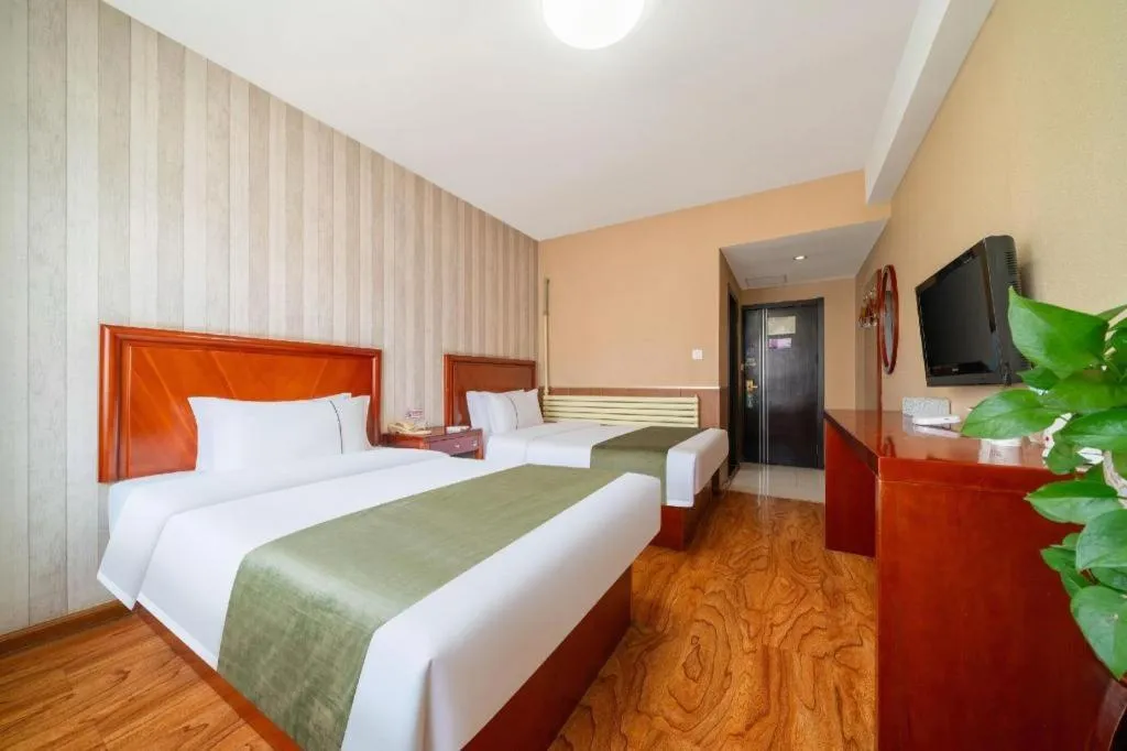Bed in GreenTree Inn Yantai Xingfu Road Marina Plaza Express Hotel