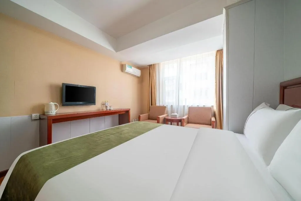 Bed in GreenTree Inn Yantai Xingfu Road Marina Plaza Express Hotel