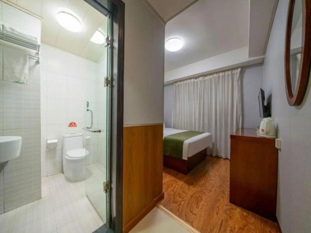 Bed in GreenTree Inn Yantai Xingfu Road Marina Plaza Express Hotel