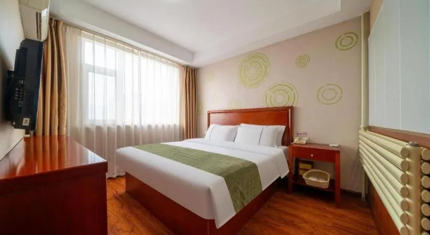 Bed in GreenTree Inn Yantai Xingfu Road Marina Plaza Express Hotel