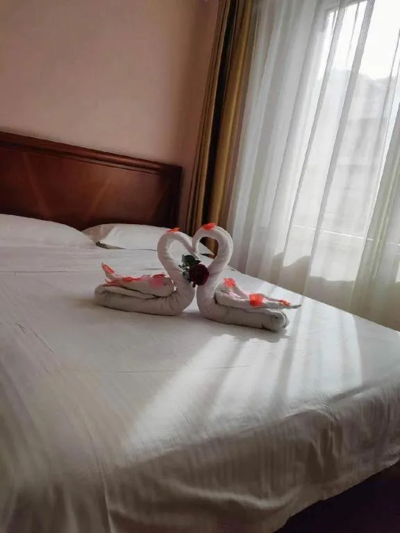 Bed in GreenTree Inn Yantai Xingfu Road Marina Plaza Express Hotel