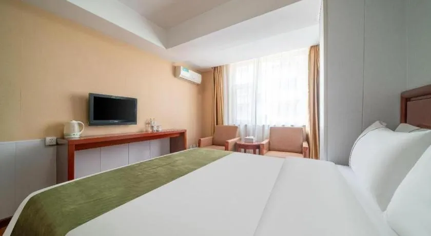 Bed in GreenTree Inn Yantai Xingfu Road Marina Plaza Express Hotel