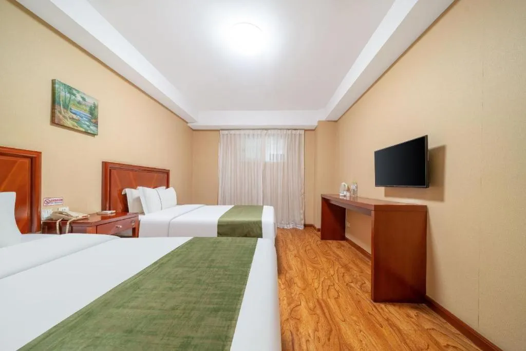 Bed in GreenTree Inn Yantai Xingfu Road Marina Plaza Express Hotel