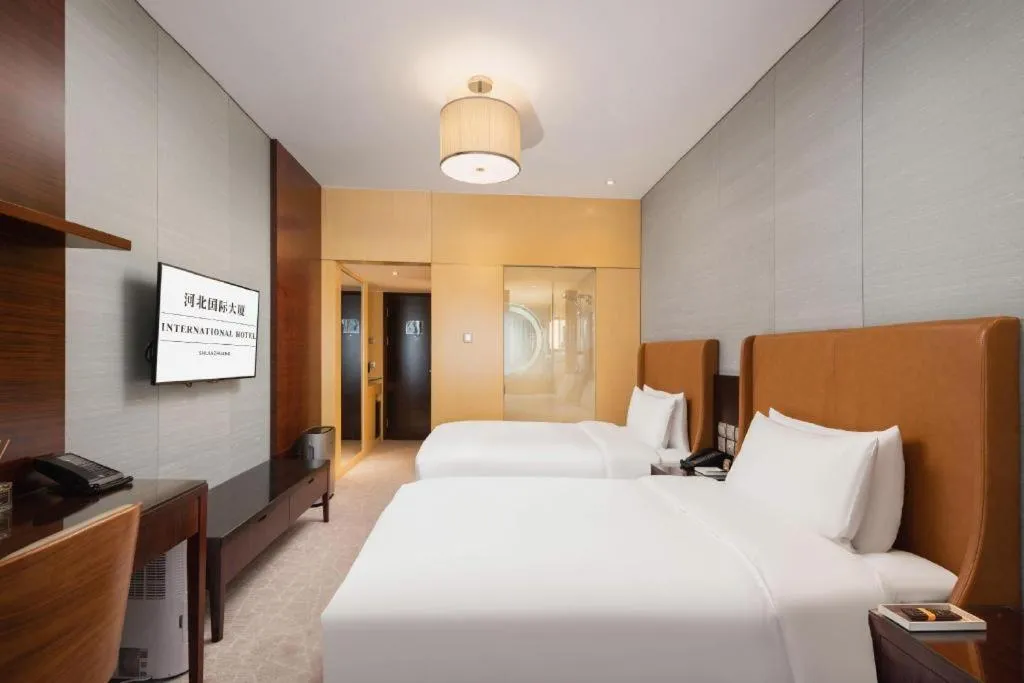 Bed in Shijiazhuang International Building Hotel