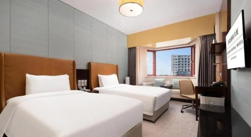 Bed in Shijiazhuang International Building Hotel