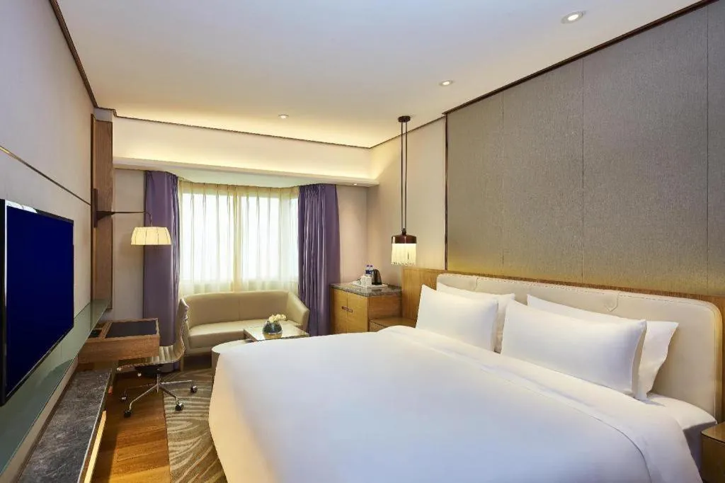 Bed in Shijiazhuang International Building Hotel