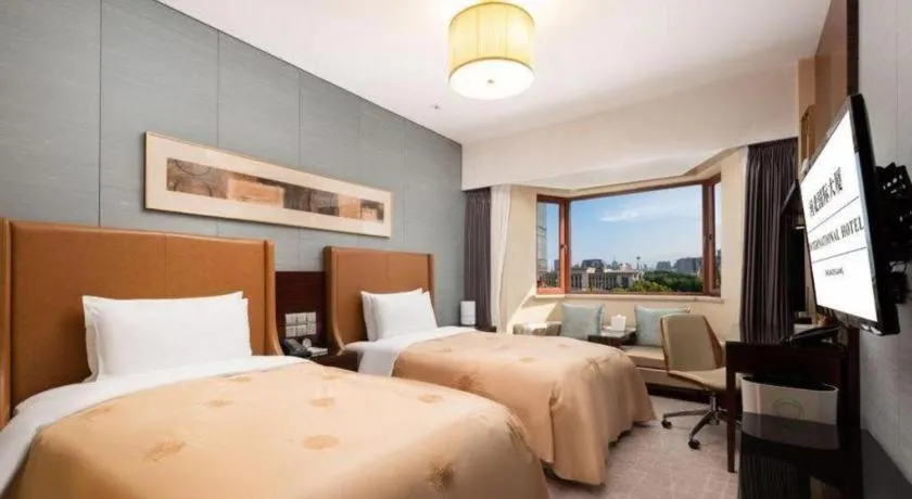 Bed in Shijiazhuang International Building Hotel