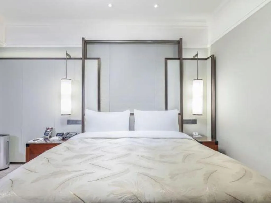 Bed in Shijiazhuang International Building Hotel