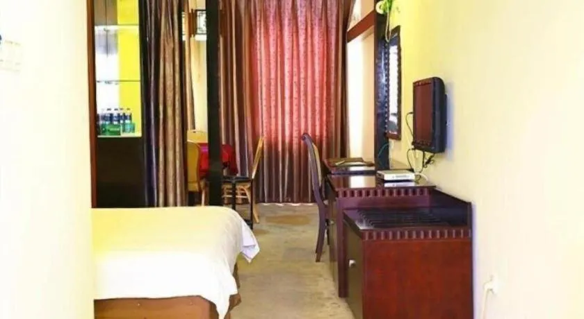 Bed in GreenTree Inn Taicang Baolong Square Hotel