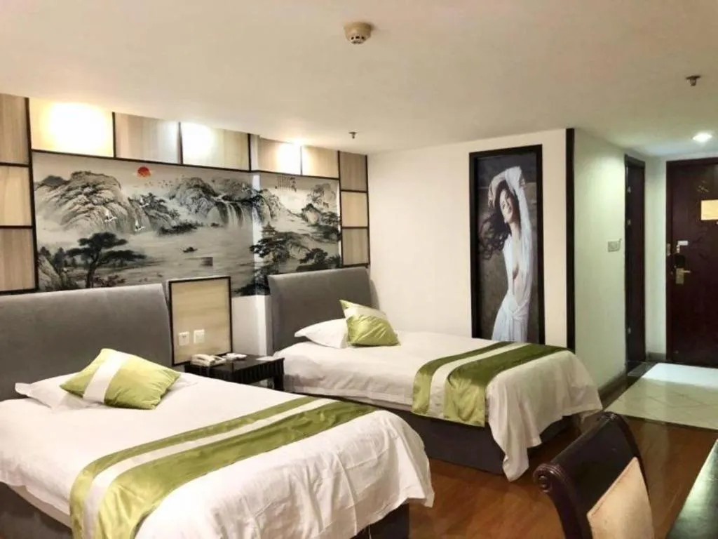 Bed in GreenTree Inn Taicang Baolong Square Hotel