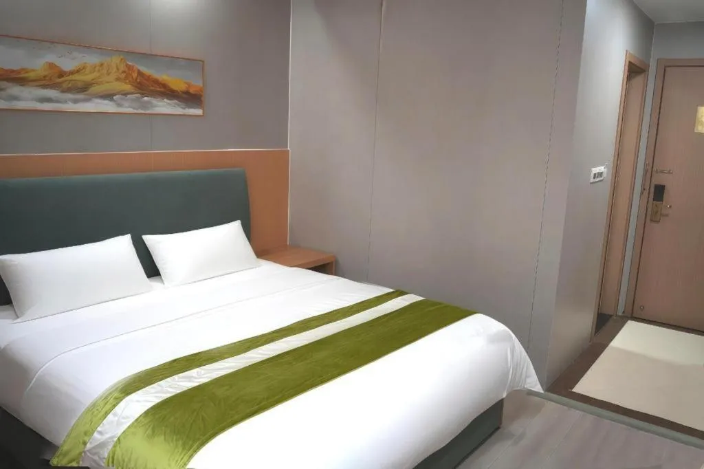 Bed in GreenTree Inn Taicang Baolong Square Hotel