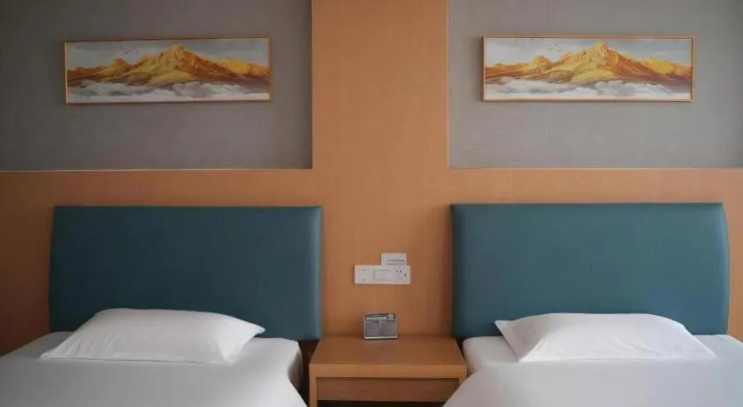 Bed in GreenTree Inn Taicang Baolong Square Hotel