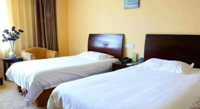 Bed in GreenTree Inn Taicang Baolong Square Hotel