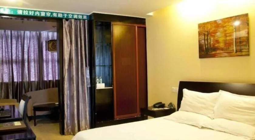 Bed in GreenTree Inn Taicang Baolong Square Hotel