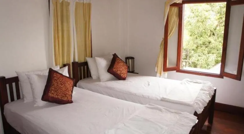 Bed in Pangkham Lodge