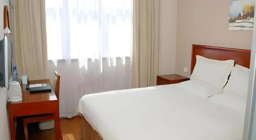 Bed in GreenTree Inn Rizhao Haiqu East Road Hotel