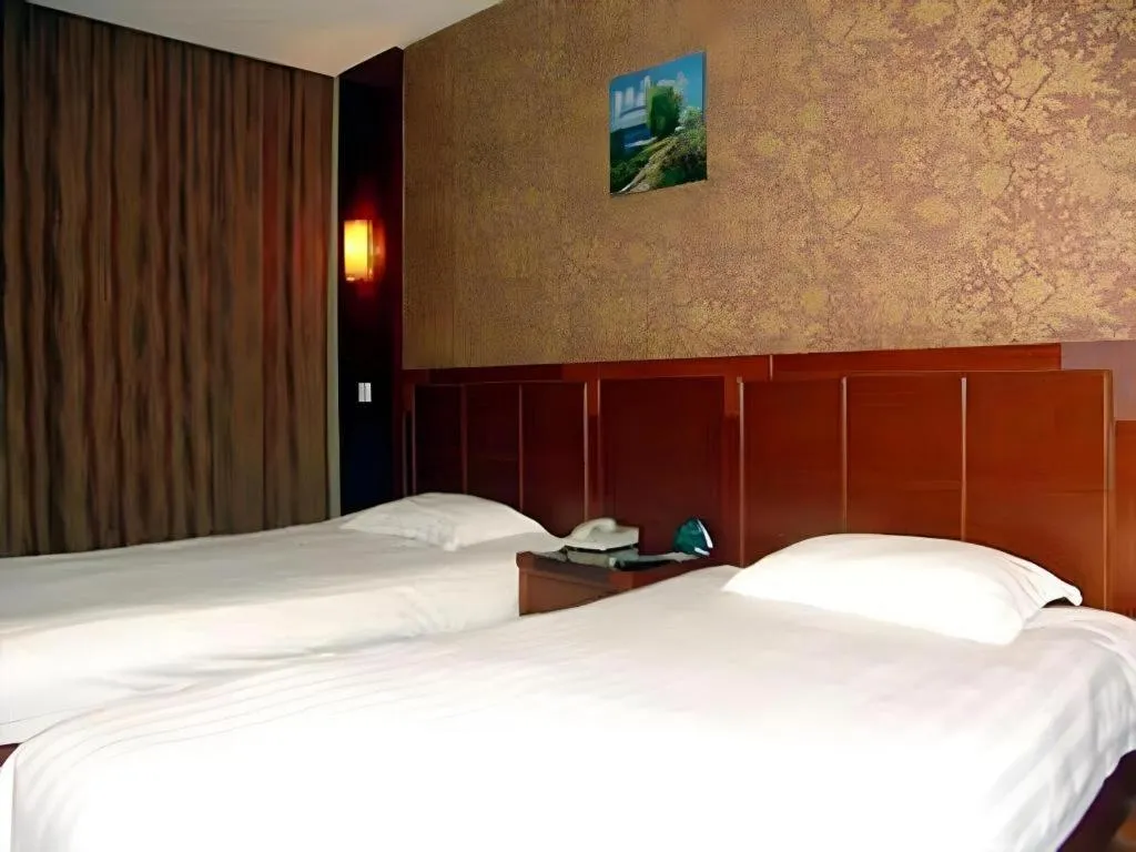 Bed in GreenTree Inn Rizhao Haiqu East Road Hotel