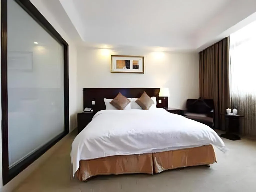 Bed in GreenTree Inn Rizhao Haiqu East Road Hotel