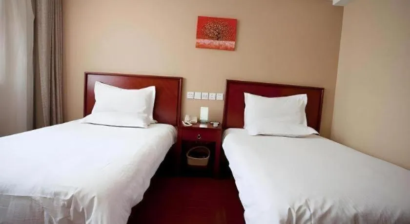 Bed in GreenTree Inn Rizhao Haiqu East Road Hotel