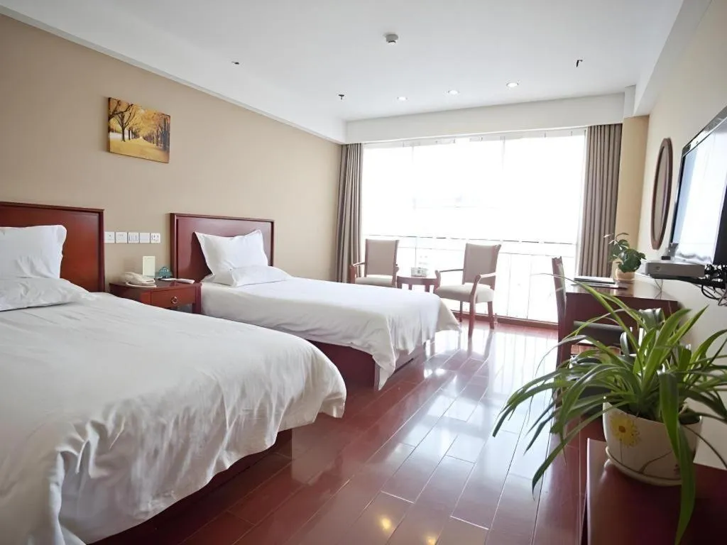 Bed in GreenTree Inn Rizhao Haiqu East Road Hotel