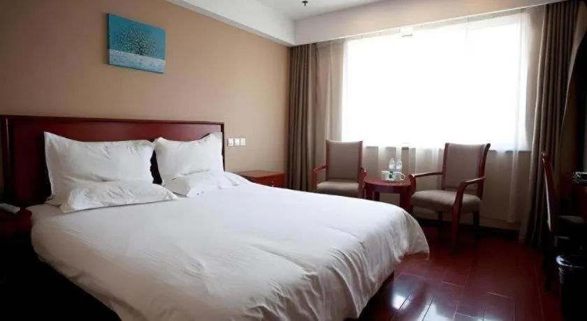 Bed in GreenTree Inn Rizhao Haiqu East Road Hotel