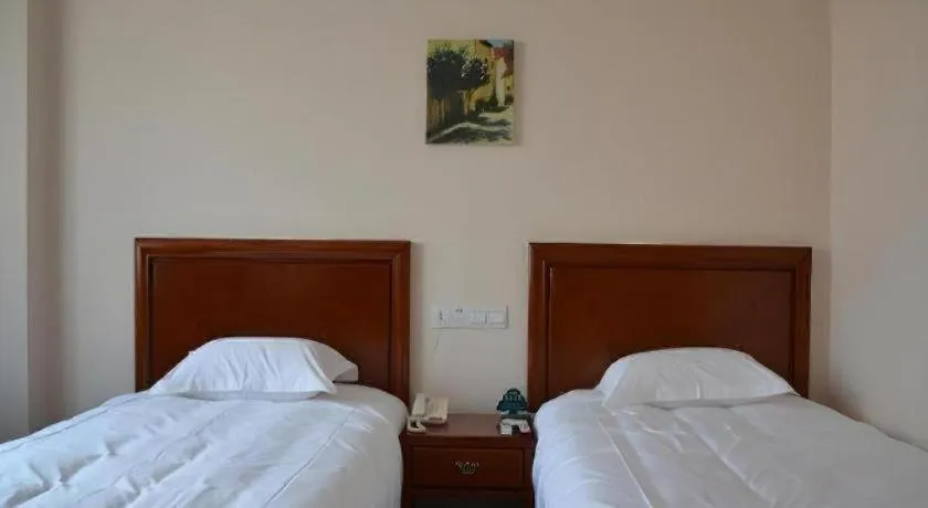 Bed in GreenTree Inn Rizhao Haiqu East Road Hotel