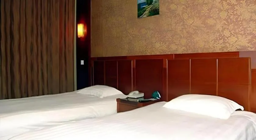 Bed in GreenTree Inn Rizhao Haiqu East Road Hotel