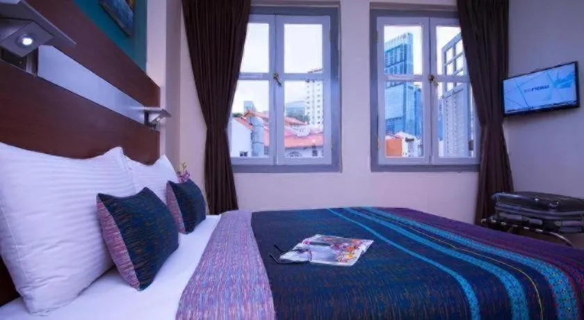 Bed in The Keong Saik Hotel