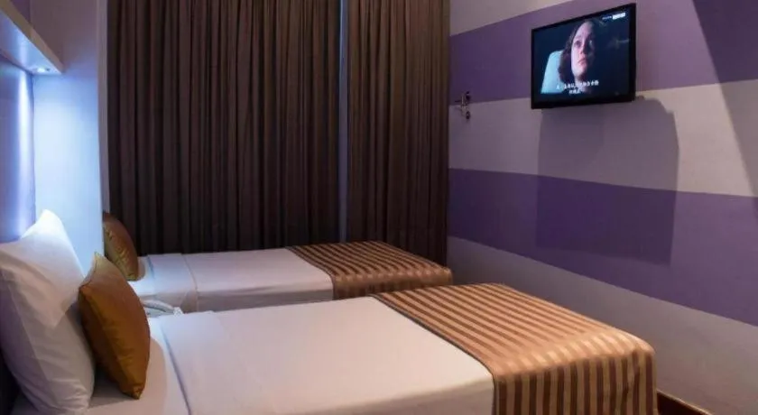 Bed in The Keong Saik Hotel